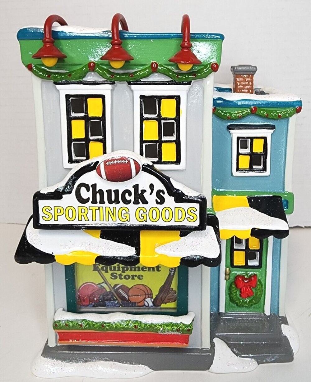 Dept 56 Peanuts Village CHUCK'S SPORTING GOODS BRAND NEW box Is ripped On 1 side